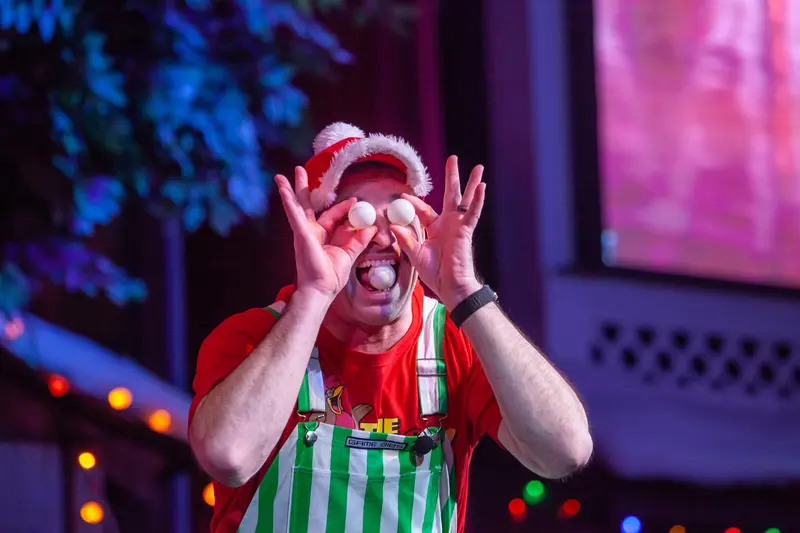 comedian during a Comedy Barn Christmas